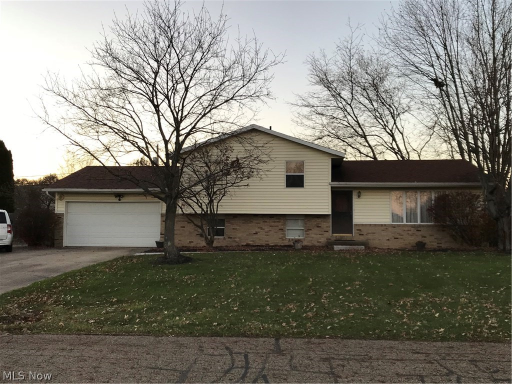 Excellent value in the spacious 4 level split.  Kitchen has been updated and includes granite countertops, hickory cabinets with pull out shelving, sizable pantry, stainless steel appliances, tin back splash, and ceramic flooring.  Also featured is a large living room and roomy eating area that is accented by a French door that leads to the deck and 16 x 30 patio.  The two full bathrooms have both been renovated. A nicely sized family room is an additional entertainment area. The electrical box has been updated and the roof is approximately 7 years old.  A two car attached garage, fenced yard and a sizable shed are also included. Due to an accident, the seller was not able to complete updates and home is being sold as-is.  This is the perfect opportunity to enjoy the current updates and finish it off with your own choices.  Call for your private showing today!!!