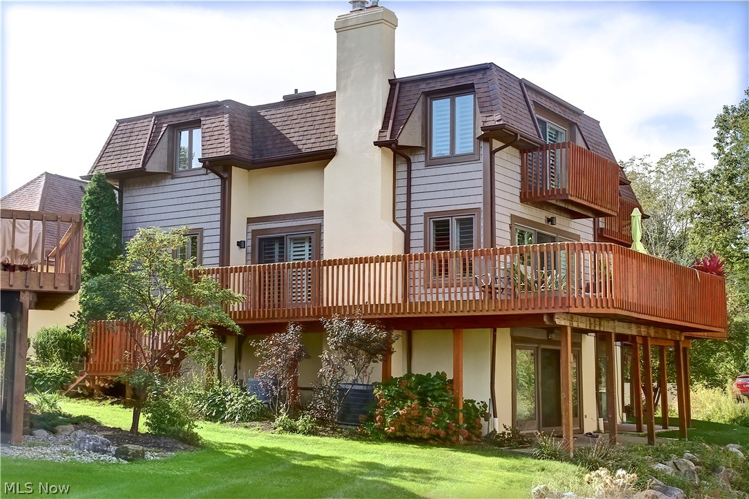 Check out the view! This ~2250 sq.ft. Condo with walk- out lower level is in the scenic Compass Rose community that offers maintenance free living on the shores of lake Erie. This home has Lake Erie views from the multiple levels and is in close proximity to charming downtown Vermilion. The development has its own marina and this unit includes a dock. Compass Rose has a sandy BEACH and a swimming pool overlooking the Lake.  Inside you will find a beautiful Kitchen with large island for gathering. Cooking is a delight on the gas stove. 2 gas log fireplaces for having a cozy fire. The AC and furnace approx 7 years old. A Spacious Family room offers a gas fireplace and slider doors lead out to a balcony offering room for outdoor furniture and more Lake views. The Master has a private balcony with Lake views and a beautiful master bathroom. The Lower level family room area includes a gas fireplace, full bath and tons of space which can be multipurpose. walk out onto the covered patio for m