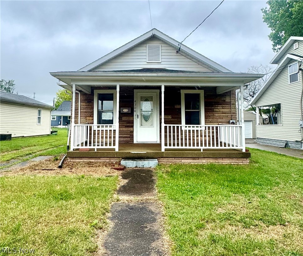 Opportunity awaits at 4300 7th Ave in Vienna, WV! This 2 bedroom, 2 bath home offers convenient one-floor living with plenty of potential for the right buyer. Features include a spacious covered front porch perfect for relaxing, as well as an unfinished basement offering excellent storage. Property is in need of updates and repairs and is being sold as-is, making it a great opportunity for investors, flippers, or buyers looking to build equity and make it their own. Convenient Vienna location close to shopping, schools, and amenities.