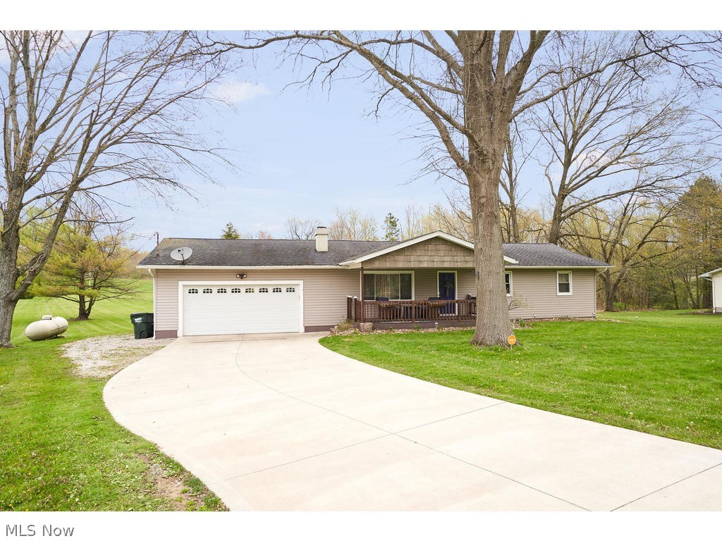 Completely updated ranch on over an acre!  Beautiful kitchen with granite countertops and backsplash.  Covered front porch, concrete driveway, shed, patio with built in grill.
