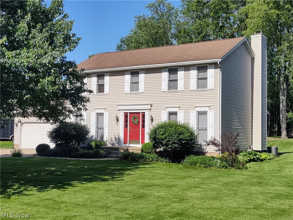 Welcome home to this well-maintained 4-bedroom colonial located on a quiet cul-de-sac street in the city of Green.  In addition to the dining room and den, the first floor offers the comfort of an eat-in kitchen and family room with gas fireplace.  The second floor features the primary bedroom with vaulted ceiling, the primary bath with skylight, and three additional bedrooms and full bath.  As a bonus, the lower level is partially finished with a recreational area and home office.  Then step outside, relax on the large deck and enjoy the view of the spacious backyard.  Updates in the last 5 years include stainless steel kitchen appliances, LVT flooring, and central air unit.