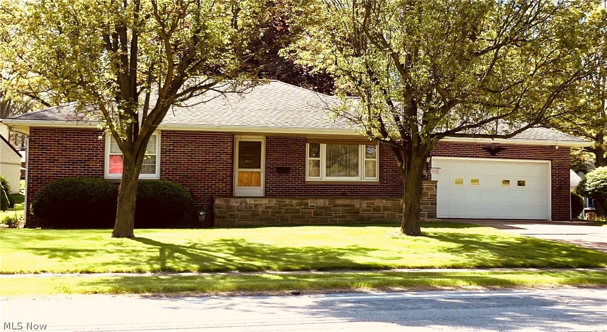 This darling brick ranch was owned by the builder and then the son. Well loved and cared for with full kitchen in the finished basement, Full bath with shower in basement. Large living room and bright dining room with a bay window plus a charming built in cabinet. Two bedrooms with hardwood under the carpet. Front porch has a built in planter. This home is in excellent condition with a list of improvements in supplements. Easy shopping across the street.