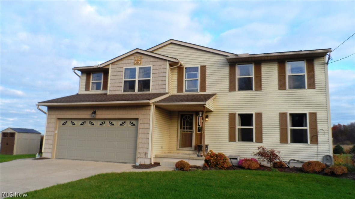 DON'T MISS OUT ON THIS INVITING 4 BEDROOM COLONIAL SITUATED ON 4+ ACRES IN WADSWORTH SCHOOL DISTRICT.  MAIN LEVEL OFFERS OPEN FLOOR PLAN FOR EASE OF ENTERTAINING WITH 1/2 BATH AND ACCESS TO DECK & BACK YARD THRU SLIDING DOORS OFF DINING AREA.  KITCHEN IS NEWLY UPDATED WITH STAINLESS STEEL REFRIG, STOVE & MICROWAVE(1YR).  PLENTY OF COUNTER SPACE & CUPBOARDS.  1ST FLOOR LAUNDRY ROOM WITH WASHER & DRYER. TAKE THE CHILL OFF WITH THE GAS FIREPLACE IN THE LIVING AREA.  BONUS ROOM ON 1ST FLOOR SERVES AS OFFICE OR COULD BE XTRA FAMILY RM.  MASTER BEDROOM HAS MASTER BATH WITH WALK IN CLOSET.  ENJOY THE OUTDOORS WITH OVER 4 ACRES FLAT YARD, DECK WITH HOT TUB FOR ENTERTAINING, AND XTRA GARAGE WITH ATTACHED CHICKEN COOP.  HOME WARRANTY INCLUDED!!  CLOSE TO MAJOR HIGHWAYS. CALL TODAY FOR AN APPOINTMENT.