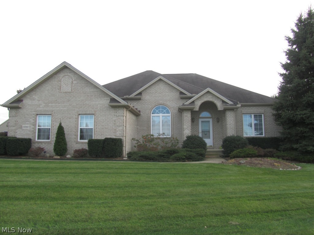 This absolutely BEAUTIFUL, move in ready, ranch home has been completely remodeled with custom upgrades through out!  This home boasts spacious an open floor plan with Brazilian cherry floors, 10-ft ceilings, some cathedral ceilings and an inviting great room accented with a gas-log see-thru fireplace.  The gourmet kitchen boasts cherry cabinets, granite counter tops, stainless appliances and a fireplace.  The deluxe master suite has a glamour bath with double vanity, jacuzzi tub and a large walk in closet.  The first floor den has double tray ceilings.  The Palladium windows, custom 1st floor laundry and full basement plumbed for a bath add to this spectacular home!  The deck is perfect for entertaining and the large yard is beautifully landscaped.  Come view today!