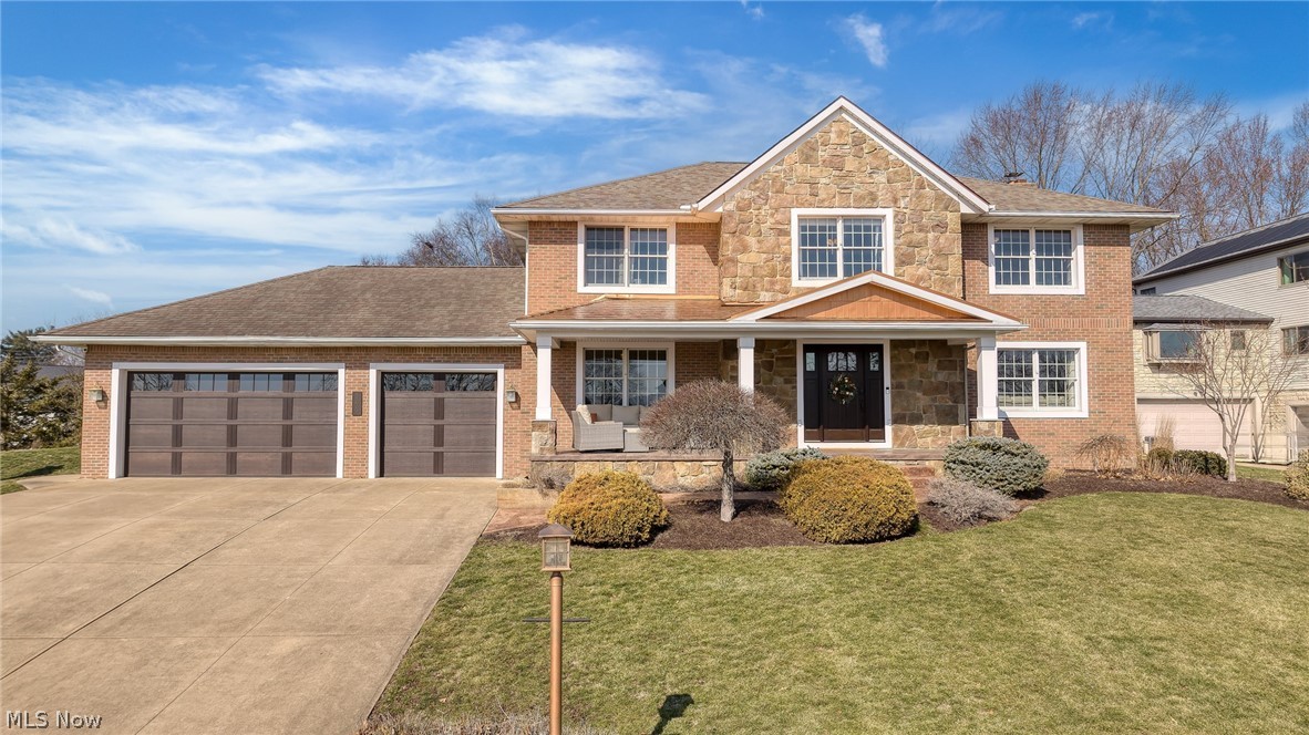 This is the one you’ve been waiting for! Welcome home to 5229 Violet Knoll Ave NE in Plain Township, located in a private lake community that’s arguably the best-kept secret in Stark County. This home offers more than just a place to live. It delivers an unbeatable lake lifestyle with boating, tubing, water skiing, jet skiing, and so much more on a stunning 140-acre lake with no horsepower limit. Situated on a quiet street, this home boasts breathtaking lake views from nearly every room. A massive 5-car garage provides ample space for cars, boats, and all of your water toys. The private boat ramp is just steps away, along with a community dock to keep your pontoon in the water for easy enjoyment all season long. Conveniently located just minutes from Gervasi Vineyard, Washington Square, and the Plain Township Amphitheater at Oakwood Square, you’ll enjoy the best of both worlds with privacy and proximity. Start your mornings watching the sunrise over the lake from the large covered front porch, or escape to the peaceful backyard area featuring a stone patio and large pergola that’s perfect for entertaining. Inside, the main level features modern updates throughout, including a remodeled eat-in kitchen that flows seamlessly into the spacious living and family rooms. A formal dining room, mudroom, guest bath, and first-floor laundry complete the main level. Upstairs, you’ll find four sizable bedrooms, including a master suite with a walk-in closet and a private bath. A second full bath with dual sinks serves the additional bedrooms. The finished lower level includes a large recreation room, third full bath, bonus room, and generous storage space. Living here makes it feel like you’re on vacation every day, and you’ll probably never want to leave. This is your opportunity to come experience lake life at its finest and start making countless memories with your friends & family. Call The Hardest Working Agent in Stark County to schedule your private showing today!