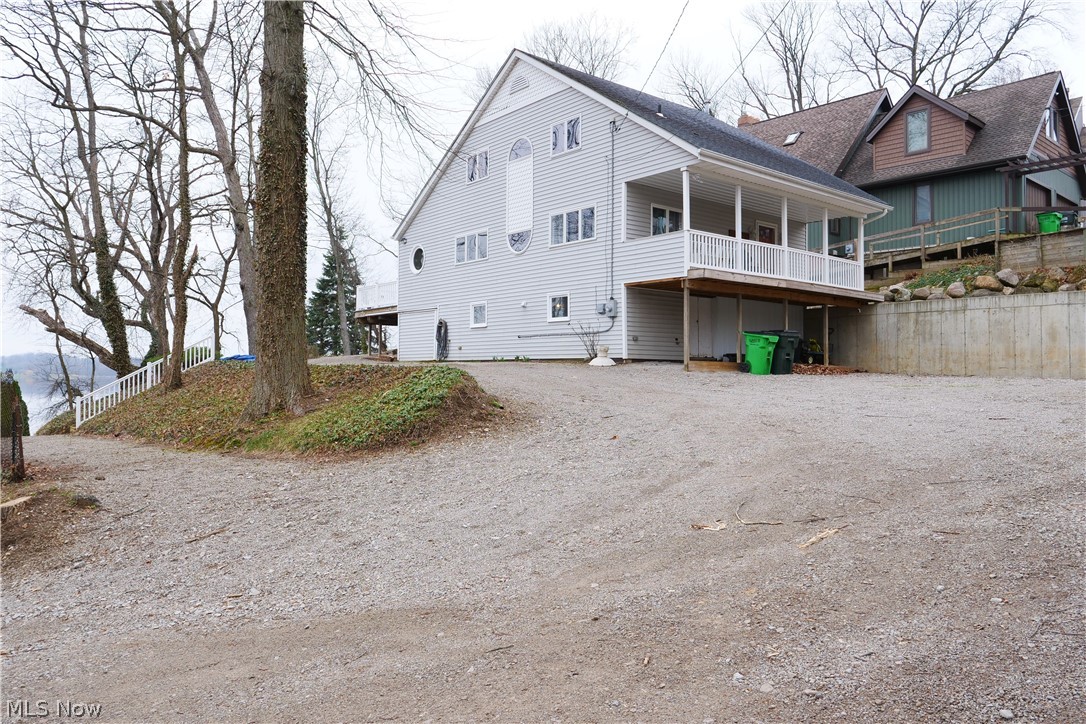 Welcome to 1376 Catherine Avenue Extension!
This beautiful lake house sits nicely on a large end lot and features one of the biggest parking areas—perfect for guests or all the toys you want to bring along.
Enjoy a private driveway leading down to your own private lakefront, ideal for all the lake activities you can imagine. Take in stunning sunset views every day that truly give you that vacation feeling that never fades. During the warmer months, you can hear live music with the windows open, and the nearby fireworks displays are said to be amazing.
As you arrive, you’ll notice the surrounding park benches—perfect for relaxing during morning or evening strolls. The backyard features a vinyl deck with wire railing, maximizing your lake views. A rock walkway wraps around the property, leading to a covered front patio—great for storm watching or enjoying your morning coffee.
Step inside and be blown away by the open-concept main floor, designed to highlight the incredible lake views. The first floor includes a bedroom and a convenient half bath. The dining room, located next to the kitchen, features three sliding glass doors with built-in blinds—perfect for letting in the lake breeze or blocking the sun when needed.
The kitchen boasts granite countertops, high-end cabinets, and stainless steel appliances—all included, even the washer and dryer. Anderson windows are installed throughout the home. Additional updates include a newer roof, updated furnace and A/C (nearly brand new), a new water tank, and an updated electrical panel with extra capacity.
The basement offers exterior access from the back and plenty of storage space.
Upstairs, you’ll find two additional bedrooms overlooking the lake, including a massive primary suite with a private bathroom and jetted tub.
The charm of this lake house is endless—come see what this beauty has to offer and experience true lake living, just minutes from the highway with a beach-like setting in your backyard.