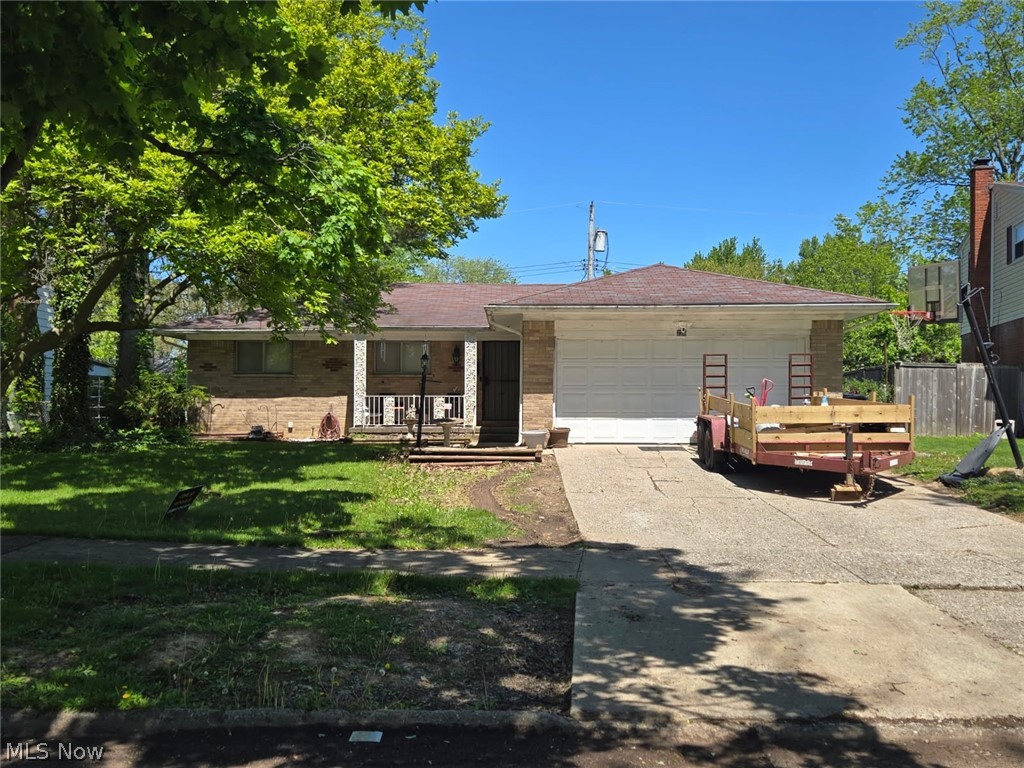 Brick ranch home in University Heights. Fireplace in living room, 2 full baths. Heat and air updated. 2 car attached garage. Needs some tender loving care to bring back its former beauty!
