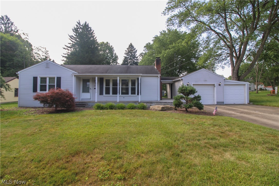Welcome to 2497 Rosewae Drive, a Youngstown ranch with the kind of layout that works for just about every stage of life. First home, right-size home, one-floor living home, “I just want something that makes sense” home. This one gets it. The living room starts things off with hardwood floors, a big front window, and a fireplace that gives the space an easy centerpiece. It feels bright, comfortable, and ready for morning coffee, movie nights, game nights, or the quiet joy of nobody asking what is for dinner.

The eat-in kitchen keeps life practical with plenty of cabinet space, room for a table, and a layout that makes everyday meals easy. The arched openings add character and keep the main living areas connected, so the house feels open without losing that cozy ranch feel.

Three first-floor bedrooms keep everything convenient, with hardwood floors and good natural light throughout. One bedroom even has a built-in desk area, which is perfect for homework, work-from-home days, crafting, paying bills, or stacking the bills until you are emotionally ready.

The full basement gives you bonus space for storage, laundry, hobbies, a workout area, a play space, or future finishing. There is also a second bath area downstairs, which is always one of those features you do not fully appreciate until you need it.

Outside, a spacious backyard, covered side access, and an  garage setup that adds everyday convenience. With one-floor living, usable basement space, hardwood floors, a great yard, and a location close to shopping, restaurants, schools, and main roads, this is the kind of home that can fit a lot of different lives and still feel like the right move.
