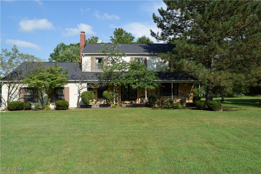 Great home, Great location nestled in Geauga County !  This one owner’s home is waiting for your magical decoration! The upstairs is complete with a master bedroom walk-in-closet & master bedroom, 3 additional bedrooms that share a full bath. The sprawling first floor has an eat-in-kitchen and a dining room that will be the center for entertainment, with a slider to step out onto the four-season room. The living room has plenty of space to spread out and relax.  Did you see that there is a First-floor laundry room! The basement has endless possibilities for a recreation room, workshop, and possible office space or gym or second kitchen. The yard once had a full sand volleyball court with plenty of parking in the oversized driveway that leads into the 3-car garage! Do not forget about the small creek that winds its way through the back corner of the yard backyard.  2023: New Furnace & Hot Water Tanks, 2024: New Roof, 2025 New Driveway.