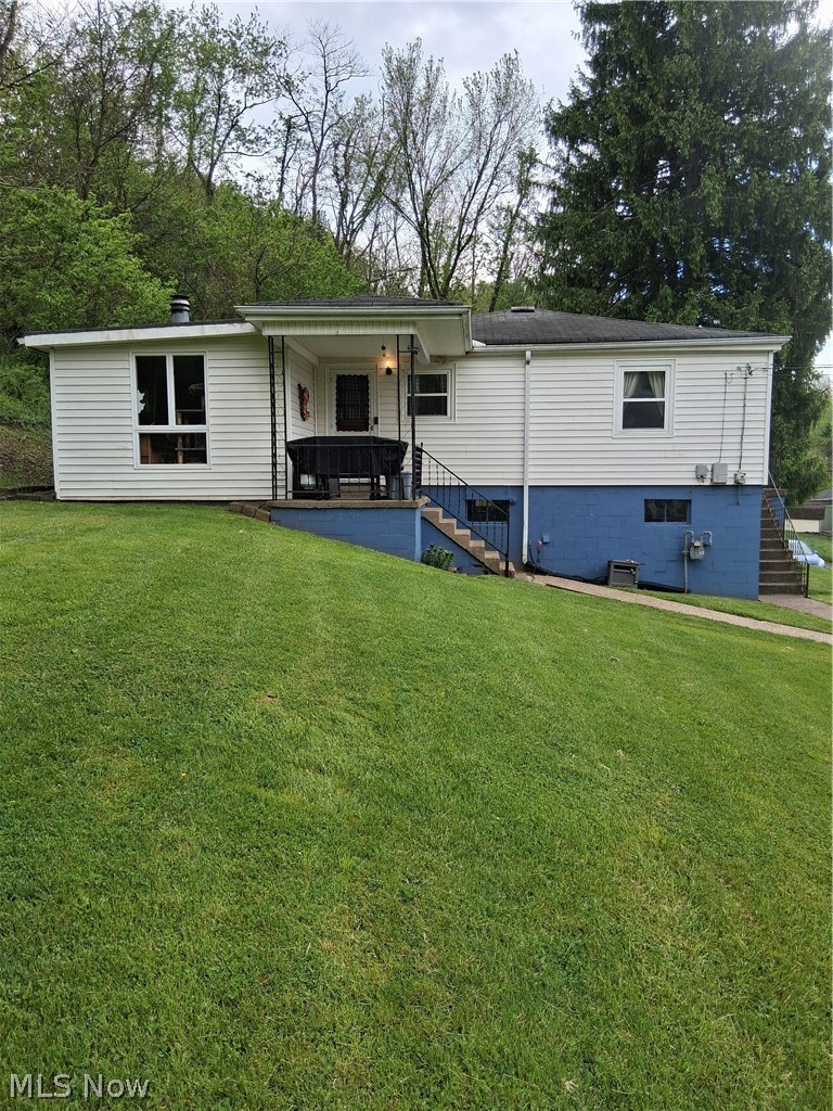 Charming 2-bedroom ranch set on a rare double lot with a large yard and beautiful overlook views of the neighborhood. This home features a flexible bonus room with a fireplace—perfect as a third bedroom, rec room, or cozy retreat. A great blend of space, versatility, and scenic surroundings.