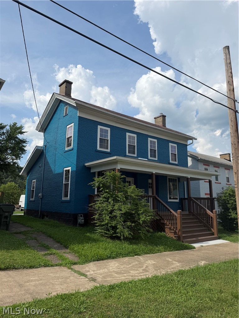 Take a Look at this beautifully remodeled solid brick home. This home has a brand new kitchen with stainless steel appliances and gas stove and butcherblock countertop. There is a 1st floor laundry with washer and dryer. Updated electric and PEX plumbing. The solid sandstone block and thick brick walls say this house is here to stay! Walk out basement and back patio for outside enjoyment,