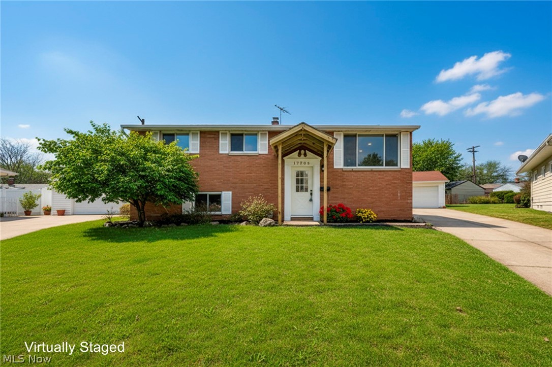 Completely renovated and move-in ready! This beautifully updated home offers modern finishes, thoughtful upgrades, and a functional layout throughout. Featuring 4 spacious bedrooms and 2 full bathrooms with over 2,000 square feet of living space, the home provides plenty of room for comfortable living and entertaining.

The main level welcomes you with a bright and inviting living area and a fully updated kitchen complete with new cabinetry, modern countertops, and updated fixtures. Both bathrooms have been tastefully renovated with stylish finishes and contemporary design. Fresh paint, updated flooring, and modern lighting throughout give the home a clean, cohesive feel.

The lower level provides additional living space with a large family room, fourth bedroom, and full bathroom, making it perfect for guests, a home office, or a recreation area. Outside, the property features a spacious yard and a detached two-car garage offering ample parking and storage.

Major improvements include a complete electrical rewire of the entire home and updated plumbing, along with a newer furnace and AC and all new kitchen appliances, providing added peace of mind for years to come.