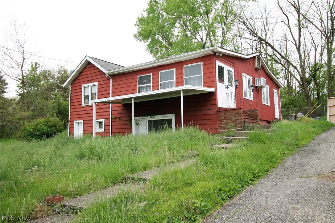 A diamond in the rough! This is a two bedroom, two full bath ranch home.  The kitchen has plenty of cabinets, and there is a large living room with dining room. There is a full bathroom on the main level. The second bathroom is in the unfinished basement. Large yard.  Great home for investors.