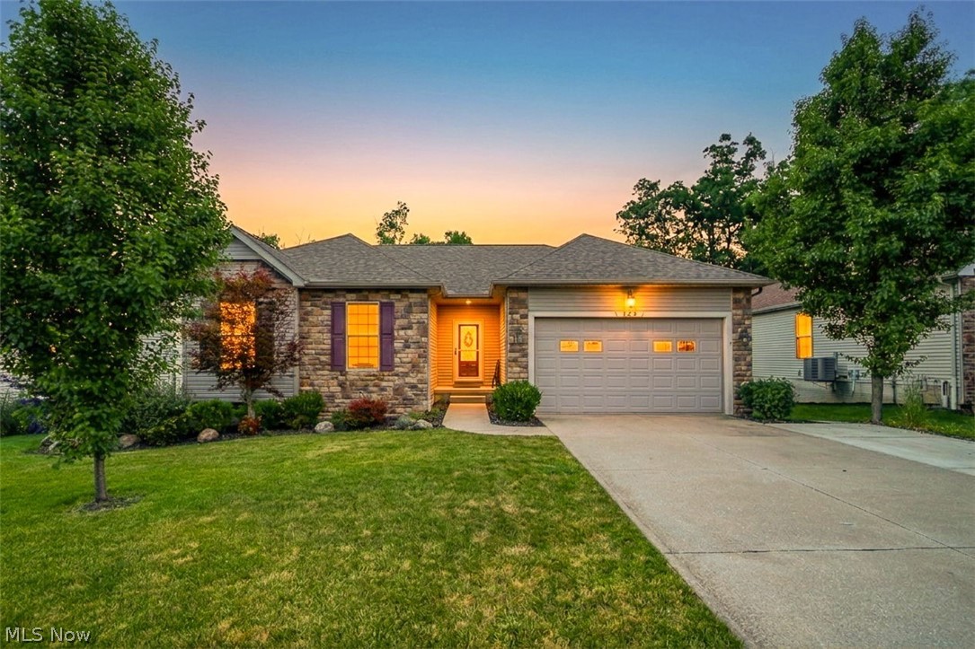 Welcome to 123 Quartz Ave, this beautiful home is one floor living with 3 bedrooms, 2 bathrooms, 1 office, conveniently located in Boulder Estates with Hudson schools. This home was built in 2010; The main floor offers a nice size master bedroom with walk in closet, 2 other bedrooms, a first-floor office, an open floor plan with plenty of entertaining space.  The kitchen flows nicely into the dining area with a door to the back patio for great outdoor entertaining. The basement has 2 great Rec room areas, mechanical room, bedroom, a full bathroom, and a walkout to the Cuyahoga Valley national park. This home is conveniently located near Highway access, EV Charging Station, and within walking distance to some great local Eateries & The Wine Mill. This one owner home has been well cared for and checks all the boxes for someone looking for a great place to call home!