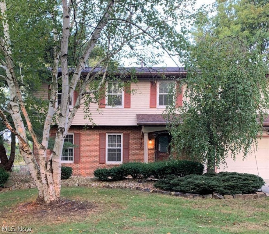 Welcome to 1084 Lawndale Drive, a 4-bedroom, 2.5 bathroom Colonial home in Tallmadge! This home has a gorgeous updated eat-in kitchen with beautiful wood cabinets, stainless steel appliances, recessed lighting, and a breakfast bar. Off the kitchen, there is a dining room, living room, and den. The den has a brick fireplace and sliding glass doors that lead to a patio in the backyard. Half bathroom located on first floor. The finished basement offers a ton of extra living space. This home comes with a camera system that works with WIFI and Apple phones. Updates to the home include: new windows, roof, and siding (2013).  Remodeled kitchen. New LVT flooring in living, dining, and family rooms. New carpet in bedrooms and staircase. Newer AC/Furnace and hot water tank. Don’t let this home get away! Schedule your private showing today!!