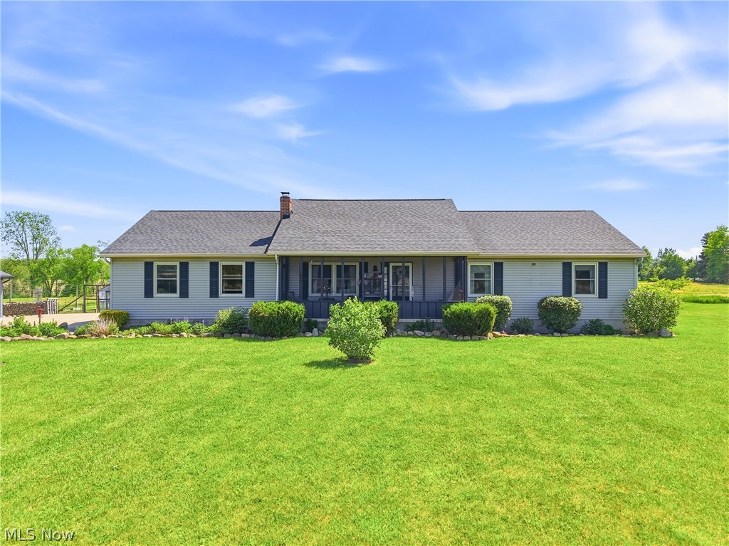Welcome to 6520 Ruff Rd, where peaceful country living meets space, character, and comfort. Situated on 3.154 acres and surrounded by open fields, this 2,600 square foot ranch offers the lifestyle so many are searching for. From the moment you arrive, you will appreciate everything this property has to offer outside, including a 20x24 barn with loft, a large fenced-in garden area to keep the deer away, and wide-open views that create a true sense of privacy and serenity. The screened-in front porch provides the perfect space to enjoy your morning coffee, unwind after a long day, or take in the quiet of the countryside. Inside and you are welcomed by warm hardwood floors, a spacious living room, and a kitchen designed for gathering. Featuring a wood-burning stove and a one-of-a-kind handcrafted center island, this space blends function and charm effortlessly. Just beyond, the great room showcases stunning cathedral pine ceilings along with a second wood-burning stove, creating a cozy yet impressive space for entertaining or relaxing. The main level offers two generously sized bedrooms along with a primary suite featuring an ensuite bath and dual closets. The lower level is partially finished and includes a dedicated workshop area, perfect for hobbies, storage, or additional living space. This home has been thoughtfully updated over the years, including a new roof in 2018, furnace and A/C in 2022, air ducts cleaned in 2022, hot water tank in 2026, Culligan water treatment system with reverse osmosis installed in 2021, new windows throughout in 2015, and a septic system replaced in 2009. The main living room addition was completed in 2018, adding even more space to enjoy. If you have been searching for space, updates, acreage, and the peace of country living, this property delivers.