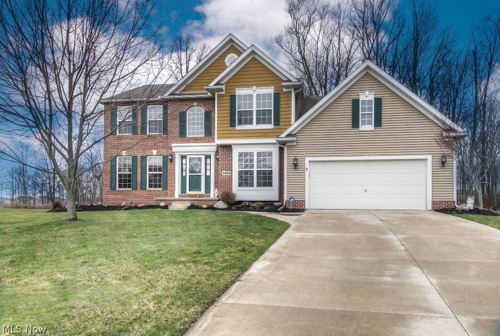 This Wagler-built home is the Lexington 4 floorplan with upgrades galore!  Note the hardwood floors in the 2-story foyer that flow into the first floor office.  There's also wonderful entertaining space with the open floor plan in the kitchen, sunroom and family room.  The kitchen has upgraded stainless appliances, upgraded cabinets and a large island.  Plus there's an extension on both the family room and garage, enabling more entertaining and storage space.  For more formal events, there is also a separate formal living room and dining room with tray ceiling.  Located in the Waterbury neighborhood with walking trails, a community center and pool, this home is also within close proximity to highways.  Welcome Home!