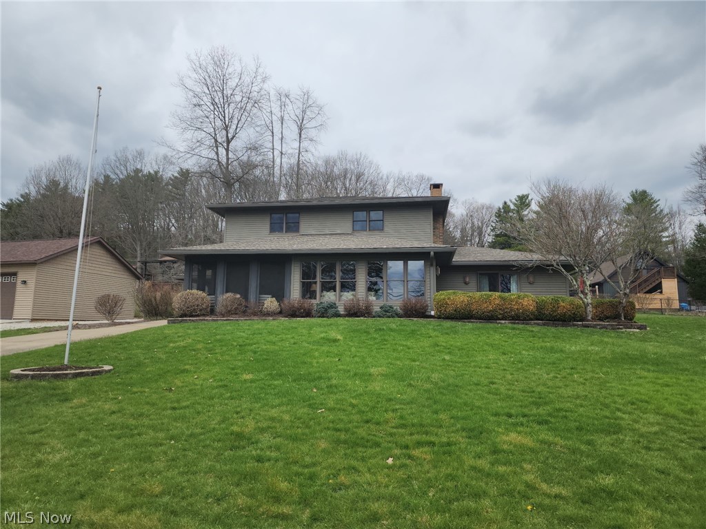 Beautiful lake home with 3 bedrooms, 3 full baths with impressive quality finishes.  Views of Atwood Lake with private 30' vinyl dock.  Raised panel wood doors.  Spacious living room features stone gas fireplace.  Updated kitchen includes stainless steel appliances.  Main floor laundry and full guest bath.  Main floor master suite includes built in cabinetry and full bath with walk in shower.  Enjoy your morning coffee or evening drink while enjoying the views from the screened in porch.  Fantastic property for year round living or a weekend get-a-way with the family.  A must see!  MWCD lease fee of $2,343 annually for 2025.