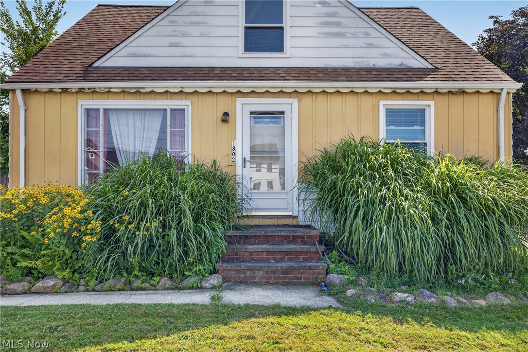 Welcome home to this well-maintained 2-bedroom bungalow, conveniently located just down the street from Wickliffe's new schools. The main floor features two comfortable bedrooms with a full bathroom, while the spacious bonus room upstairs offers endless possibilities as a third bedroom, playroom, home office, or additional living space. The partially finished basement includes a half bathroom, providing even more room to customize and make it your own. Whether you're a first-time home buyer, downsizing, or looking for extra space, this home has plenty of potential. Home is being sold as-is.