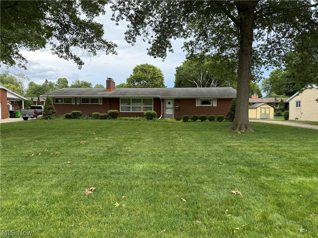 Welcome to this spacious 1,772 sq ft solid brick 3-bedroom ranch on Weber Avenue with a .33-acre yard! It has a large living room with a fireplace, a primary bedroom with a half bath and an additional full bath in the basement. The kitchen overlooks the huge family room which leads out to the screened-in porch. The basement has a recreation room with another fireplace. The previous owner moved the laundry upstairs to the 3rd bedroom, but hook-ups are also available in the basement. This home has been well maintained, and the mechanical systems are up to date.
