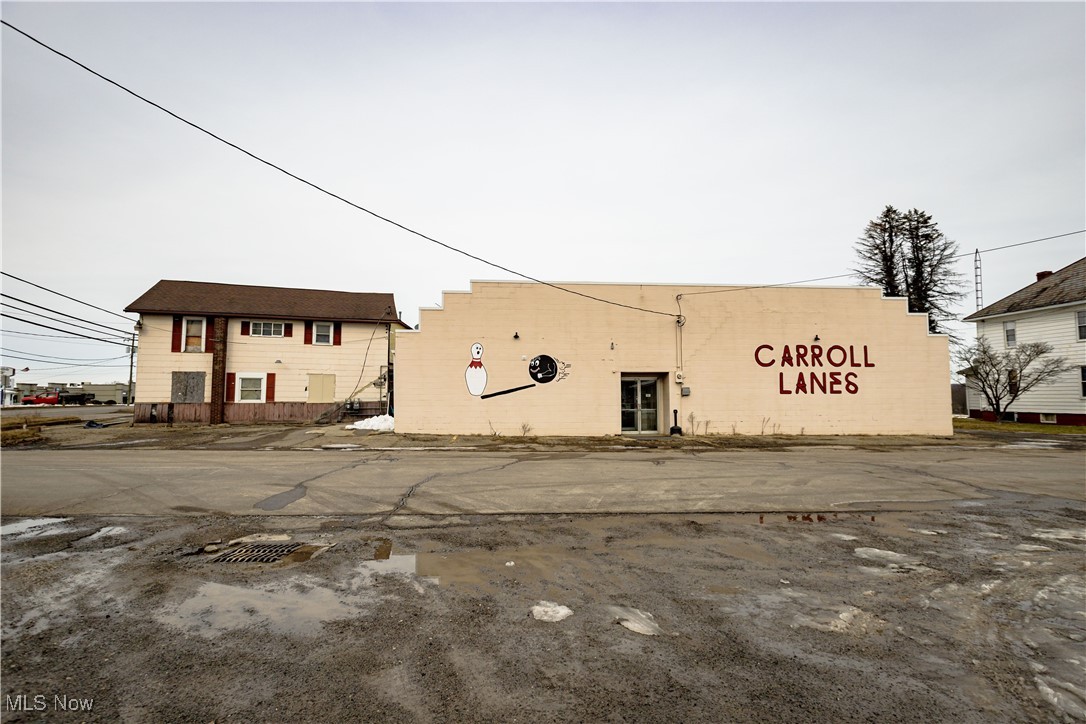Here is your opportunity to own the "Carroll Lanes" bowling alley conveniently located along the main business district in Carrollton!! The 10 lane bowling alley has been recently updated with new synthetic lanes, new scoring system, new restrooms and more. The sale includes the real estate (5 parcels) , equipment/inventory and business. This rural bowling center is a great opportunity to own a family friendly facility with the ability to have leagues, private parties, open bowling and much more. There is huge potential in the attached restaurant/bar that was in the process of being remodeled and needs finished. This property has endless potential and it's in a prime location with high traffic and it could be an excellent investment for a savvy buyer. It is zoned B-2 Highway Business.