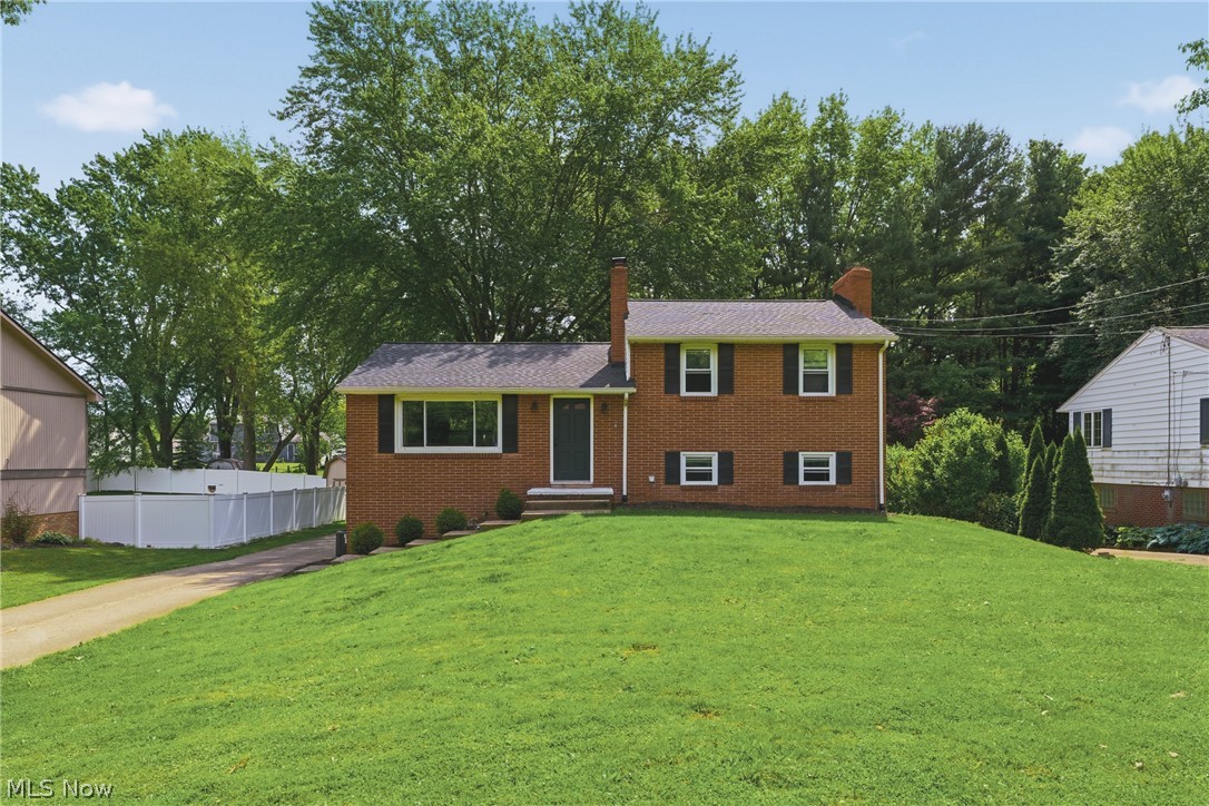 WOW! You do NOT want to miss your chance to live in Jackson Local Schools by Lake Cable! Situated on a large lot with a private, wooded backyard this home has a TON to offer. As you pull in the driveway the first thing you will notice is the beautiful brick exterior. Make your way into the home and you will be greeted by the meticulously maintained living room that opens up in to the fully updated eat-in kitchen with stainless steel appliances and granite countertops. The second floor is complete with 3 spacious bedrooms and a full bathroom. Head downstairs to find a massive family room perfect for family movie night, children's play room, or home office. Off the back of the lower level is a large fully enclosed and heated patio with a huge wooden deck where you can enjoy your private wooded backyard during those gorgeous summer nights. With the airport, Belden Village, and Lake Cable all within mere minutes, the location could NOT be better. Did I mention this address qualifies for its own dock on the lake? Call today to schedule your private showing before it's too late!