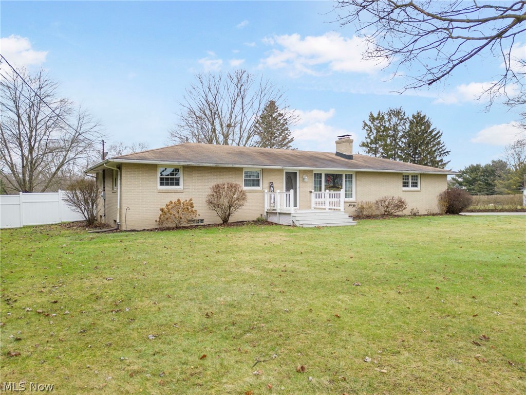 Welcome to 5147 Broadway Ave in Louisville, OH! This charming brick ranch offers space, functionality, and flexibility. Featuring 3 bedrooms on the main level, a comfortable primary suite with half bath, and a functional layout designed for everyday living. The connected kitchen and dining area features an eat-in breakfast bar, stainless steel appliances that convey, and easy flow into the spacious living room, which comfortably fits a sectional and includes a cozy fireplace. The updated full bathroom features a walk-in shower, while the recently remodeled lower level adds valuable square footage with a second living area/ bonus bedroom, game room, and plenty of additional storage. Sitting on over half an acre, this home also offers a spacious front porch, shed, back patio, and a large yard with room to enjoy. With easy access to highways, restaurants, and shopping, this home combines comfort, convenience, and room to grow. A new roof will be installed prior to closing & new owner may choose the color once an offer is accepted.