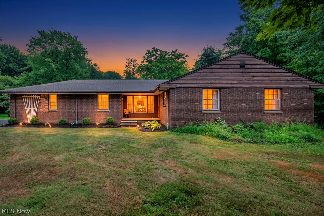 Welcome home to this beautifully updated 4-bedroom, 2-full-bath ranch nestled on over 1.5 picturesque acres in desirable Chardon, Ohio. Offering the perfect blend of modern updates and peaceful country living, this move-in-ready home provides the space, style, and functionality today's buyers are looking for.  Step inside to an inviting open-concept floor plan designed for both everyday living and effortless entertaining. At the heart of the home is the stunning gourmet kitchen, featuring premium finishes, abundant cabinetry, and an oversized center island that serves as the perfect gathering place for family and friends. The seamless flow between the kitchen, dining, and living areas creates a bright, spacious atmosphere filled with natural light.  The thoughtfully designed layout includes 4 bedrooms (1 currently used as an office) and two beautifully updated full bathrooms, providing plenty of room for family, guests, or a home office.  Outside, enjoy the privacy and tranquility of more than 1.5 acres of beautifully maintained property, offering endless opportunities for outdoor entertaining, gardening, recreation, or simply relaxing while taking in the scenic surroundings.  The large stamped concrete patio provides versatile outdoor living space.  Located just minutes from Chardon's charming town square, parks, shopping, dining, and highly rated schools, this exceptional property combines modern comfort with the serenity of country living. Don't miss the opportunity to make this stunning ranch your next home!