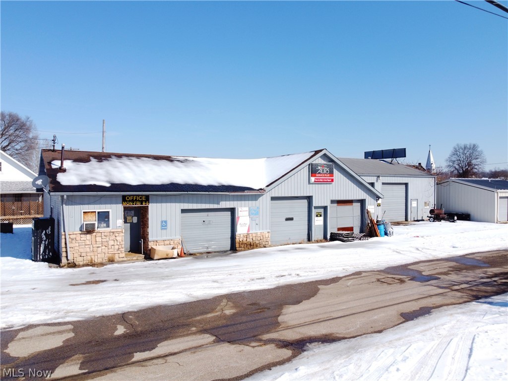 Explore the property at 401 & 403 29th Street in Vienna, WV, a spacious warehouse exceeding 4,000 square feet, conveniently located in the heart of downtown Vienna. This building offers ample parking to accommodate various business requirements and features five drive-in doors, ranging from 8.5 to 12 feet, providing versatility for potential new business. Additional amenities include electric unit heaters, a recycled oil furnace, office space, and large overhead doors, making this building well-equipped for new ownership and business opportunities.