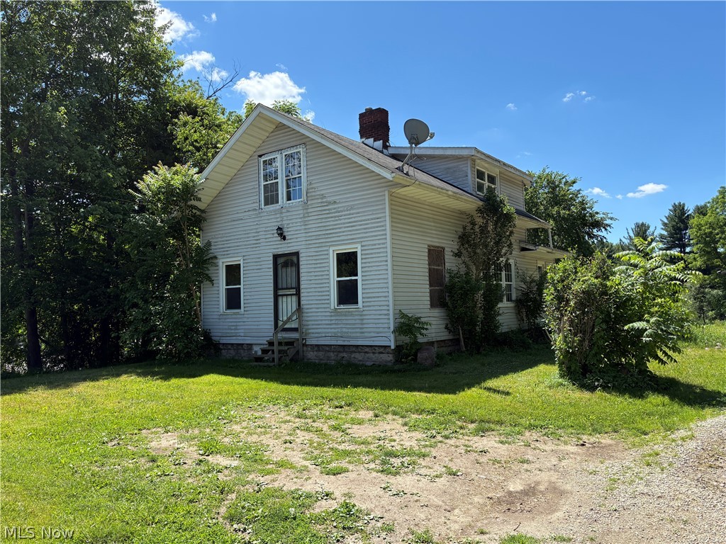 Attention Investors...Rare opportunity for fixer upper on an acre and a half in Copley with a small pond in the backyard. Home needs a good deal of work to restore it to its former glory but enjoys classic features and layout. Property has large back deck over looking the sprawling backyard. Property also features an absolutely HUGE outbuilding. Large enough to store up to six cars or larger trucks and boats! Home sits on a partially wooded lot and enjoys the privacy of country living but is just a few miles from highway and close to local restaurants and shops. All this  and Copley schools! Don't miss your chance at a truly unique opportunity.