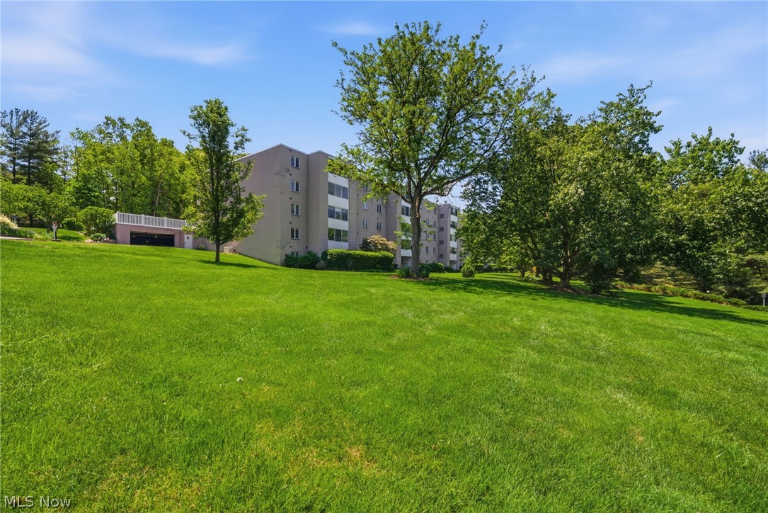 Welcome to maintenance-free living at its finest in the highly desirable Whispering Heights community of Cuyahoga Falls. Nestled among mature trees in a peaceful, park-like setting, this beautifully updated condominium offers the perfect blend of comfort, convenience, and affordability.

From the moment you enter, you'll appreciate the extensive updates throughout, including fresh paint, new flooring, updated lighting, a new electrical panel, upgraded plumbing fixtures, new sinks and faucets, and solid-core doors extending from the front entry to the private patio. The completely remodeled bathroom and thoughtfully selected finishes create a modern, move-in-ready feel that today's buyers are searching for.

The kitchen is equipped with brand-new stainless steel appliances (2026), while major mechanical updates—including a new furnace, central air conditioning system, and water heater (2024)—provide peace of mind for years to come.

Enjoy your morning coffee or unwind in the evening on the quiet private patio featuring ceramic tile flooring and tranquil surroundings. Whether you're looking to simplify your lifestyle, downsize, or purchase your first home, this residence delivers exceptional value.

Life at Whispering Heights means leaving the maintenance behind. The monthly association fee covers nearly everything: electric, gas, water, trash removal, exterior maintenance, landscaping, snow removal, Spectrum cable, reserve fund contributions, and access to an impressive collection of amenities including a swimming pool, fitness center, library, community gathering spaces, and secure building access. With taxes and phone service as your only additional monthly expenses, ownership is remarkably predictable and affordable.

Simply move in, unpack, and start enjoying everything Cuyahoga Falls has to offer.