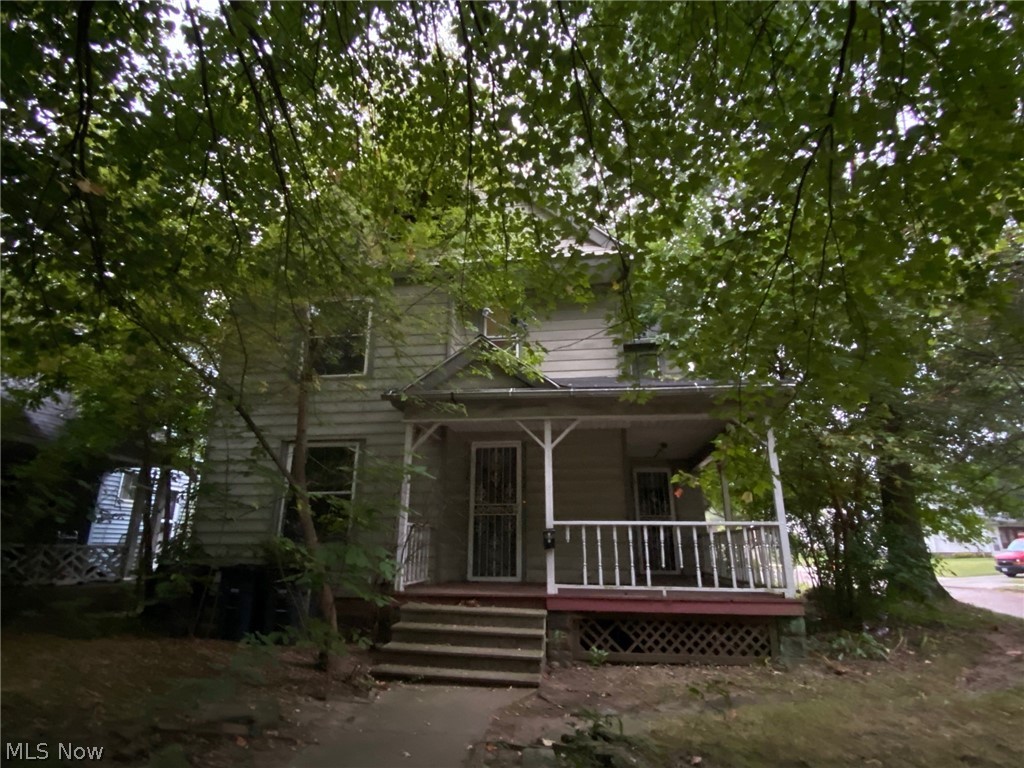 If you love Victorian architecture, this one could be for you! Great original details like tall ceilings, natural woodwork, spindled staircase open at the second floor, pretty corner fireplace with over-mantle, along with great original light fixtures in the first floor rooms. Large kitchen has moveable islandand cubbie for refrigerator which is currently being used as a pantry. The formal dining room has a sunny box window on the south side of the house along with built-in china cabinet with glass doors. The first floor has a full bath with tub/shower. On the second floor are four carpeted bedrooms off the central hallway along with another full bath with classic footed tub. The third floor has an old sink base plus another large bedroom and two closets, one that was intended to be another bathroom. This property was once a two unit so there are two furnaces one of which is new. All of the windows have been replaced and the roof is approximately 10 years old. This is a great place to