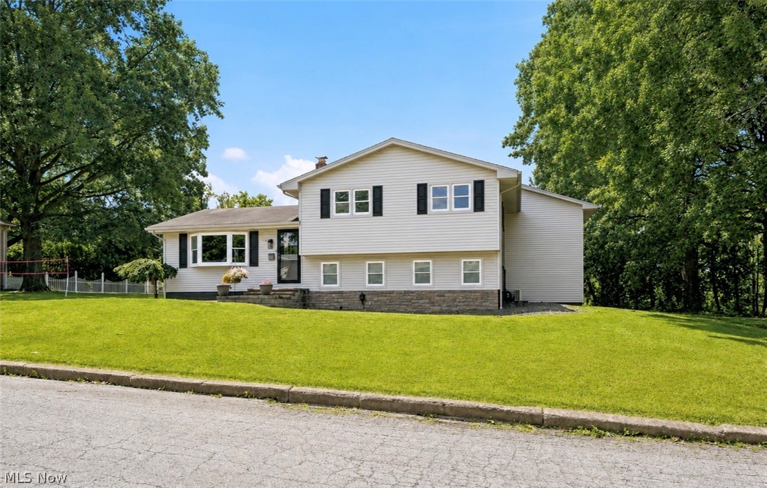 A Hidden Gem in Columbiana! Tucked away in a private pocket of Columbiana at the end of a quiet dead-end road, this beautiful move-in ready home offers the perfect combination of privacy, space, and modern updates. Featuring 3–4 spacious bedrooms and 3 full bathrooms, this meticulously maintained home is in mint condition and ready for its next owners. The impressive primary suite is a true retreat, complete with a completely renovated luxury en-suite bath showcasing high-end finishes and exceptional craftsmanship. The home offers both spacious living and family room areas, providing plenty of room for relaxing or entertaining guests. The beautiful cherry kitchen is the heart of the home, offering abundant cabinetry, generous workspace, and an ideal layout for hosting family and friends. Additional highlights include:Vinyl-sided exterior for low-maintenance living
Attached 2-car garage equipped with electric service for EV chargers. Beautiful park-like backyard with mature landscaping, Storage shed for added convenience. Move-in ready with pride of ownership throughout. If you've been searching for a home that offers privacy, quality, and exceptional living space in one of Columbiana's most desirable settings, this is it.