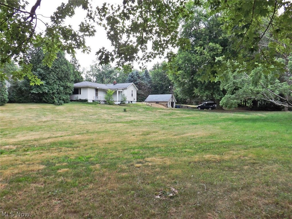 Three bedroom home with garage on 1.19 acres on the corner of Manchester Rd. and W. Comet Rd.