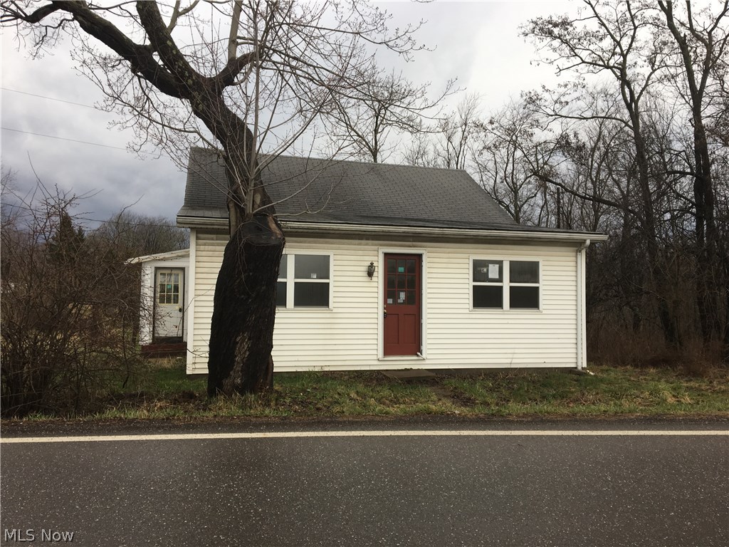 2 BR, 1 bath home w/great potential. Floor plan would allow option to use rooms for different purposes than listed. Dbl lot - both have dimensions 52x132. Oversized garage. Public record is 666 square feet which does not include 2nd floor. Heat source most likely propane but tank is not present.