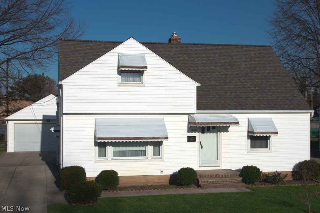 Quality and Comfort are yours here in this super charming cape-cod! You will feel the pride of ownership greeting you as you enter is the slate floored entryway (Beautiful) and large living room offering wonderful natural light and pristine flooring (with hardwood underneath).  A very nice and open kitchen with good cabinet storage and counter top space to work with, and wonderful built in shelves off the picture window perfect for the herb garden or handy appliances. The first floor bedrooms are spacious for this style and offer great closet space.  The bedroom up stairs features immaculate flow throughout and has a half bath with additional storage space. The lower level recreation room is dry as a bone and offers plenty of space to finish off as you desire, with newer high efficiency HVAC!  With the Mayfield Elementary School in your back yard, the location couldn't be better.  When you are here, you are home!