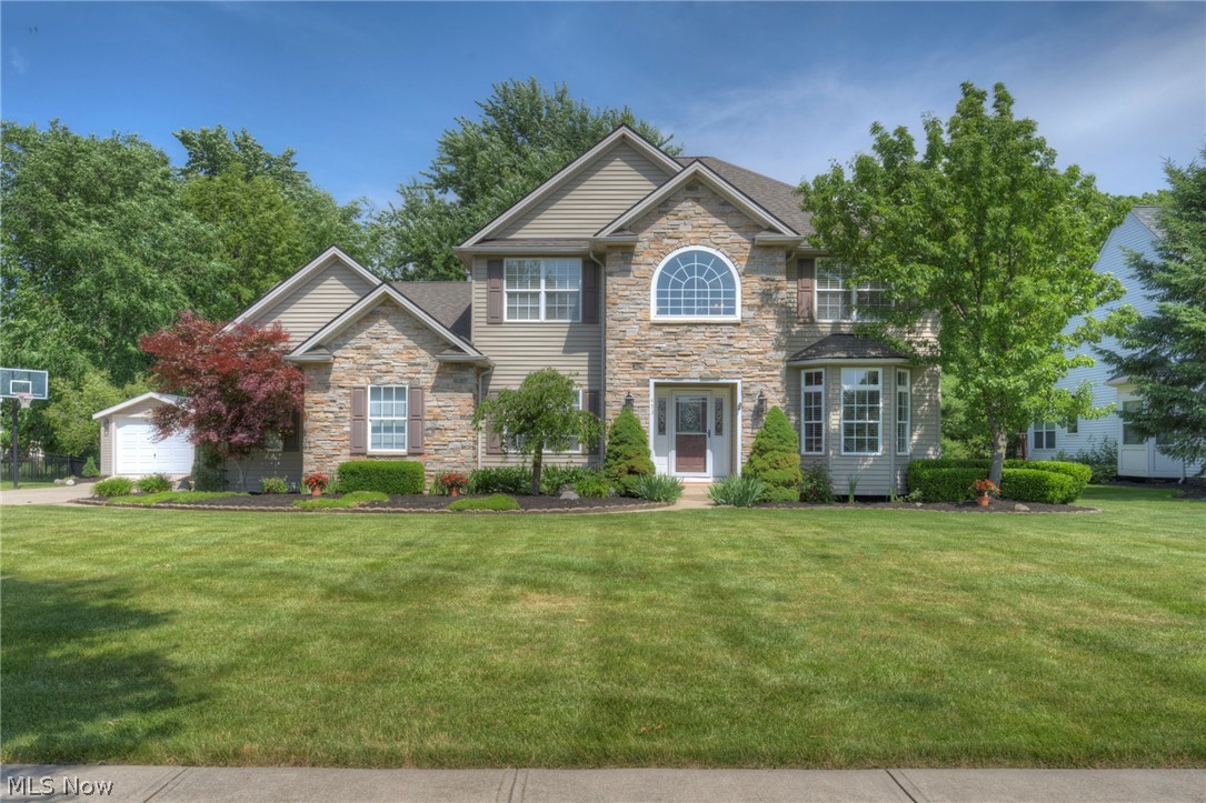 Welcome to this beautiful, completely updated Gamellia built home on a quiet cul de sac with 9 ft. ceilings, 2 story foyer and vaulted great room.  This 4 bedroom, 4 full bath home with office and first floor laundry/mudroom offers the option of an in-law suite with it's own sitting area or 2nd office and living room.  The beautifully appointed kitchen offers an oversized island, double oven and stylish granite counters, wine/beverage cooler, gas stove and built in grill with hooded exhaust overlooking a brand new 2021 stamped concrete patio in a private, professionally landscaped  rear lot with 6 ft wooden privacy fence and full lot irrigation system.  The second floor offers 3 bedrooms, a shared full bath and a large master bedroom with large en suite bath and walk in closet.  The lower level has a fully finished rec room with a pool table that stays, a full bath and an additional living space.  Two car oversized side entry garage with a detached 1 car garage or storage shed.  This l