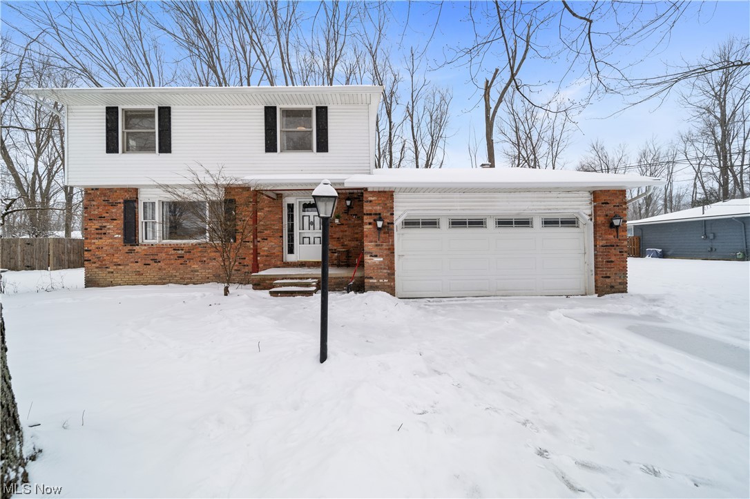 Captivating colonial home for sale in Mentor, Ohio! This delightful 4-bedroom residence is a perfect blend of charm and modern updates. Step into the inviting foyer and be welcomed by the living room the ideal spot for creating lasting memories. The heart of the home is the family room, where a cozy fireplace creates a focal point for gatherings, providing a comfortable space to relax and unwind.

The well-equipped kitchen is designed for both style and functionality, with modern appliances and ample storage. Upstairs, discover four generously sized bedrooms, each offering ample natural light and closet space.

One of the highlights is the fully fenced backyard, creating a private oasis for relaxation and play. Imagine summer gatherings on the patio, surrounded by lush greenery. Additionally, a brand new roof adds to the home's appeal, ensuring durability and peace of mind.

Located in the sought-after area of Mentor, this home is close to schools, parks, and shopping, offering convenience and a sense of community. Don't miss the chance to own this colonial gem, where classic charm meets modern amenities. Your dream home awaits!
**1-Year Home Warranty Included in sale by America's Preferred Home Warranty**