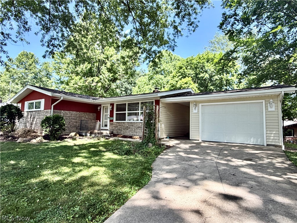 Discover the potential in this well-maintained 3-bedroom, 1-bath ranch located on a quiet street in an established neighborhood of attractive homes. Just a two-minute walk to the river, you'll enjoy easy access to fishing, canoeing, and peaceful evening strolls.

Inside, you'll find hardwood floors, an updated bath with a walk-in shower, and a functional kitchen with a sink overlooking the private, fenced backyard. The full walkout basement offers abundant storage, future living space, and direct access to the backyard. A breezeway connects the home to the attached one-car garage.

Major improvements include a new furnace and central air (2023) and new roof shingles (2025), providing years of worry-free ownership. For added buyer confidence, a professional home inspection has already been completed, the report is available for review.

A solid home with major updates already completed—bring your personal decorating touches and make it your own. Schedule your private showing today!