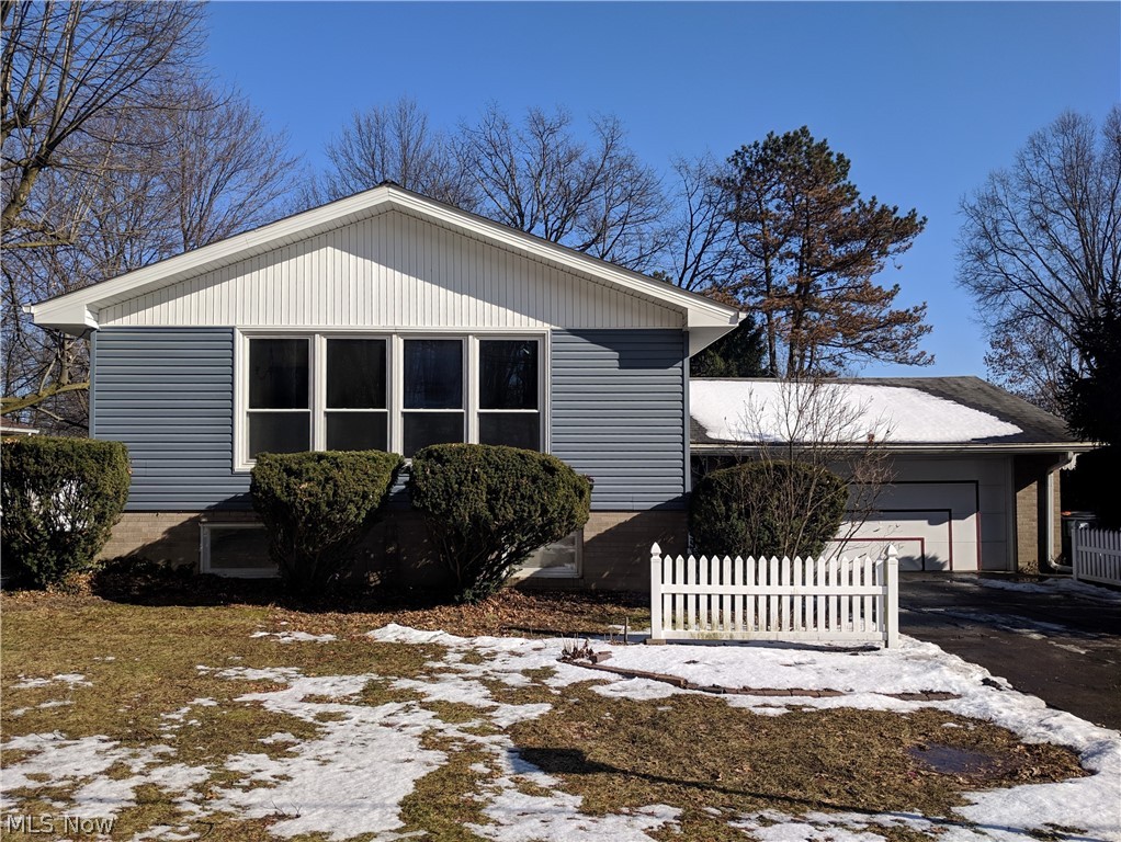 Need more room? Look no further. This North Canton home offers 1905 SQ FT 4 BR 2 BA and has an attached oversized 2 car garage. This  prime location is walking distance to The Chapel and minutes from I77 , The Strip, Belden Village and the YMCA. The main level has  big living room, formal dining, kitchen, 3 bedrooms and an enormous full bath with skylight. The lower level has a huge family room w/stone fireplace, 16 x 13 bedroom/office and a full bath. Plenty of room in the garage for all your toys! Some updates include vinyl windows, vinyl siding, dishwasher, disposal, new carpet in master bedroom and a thermostat.