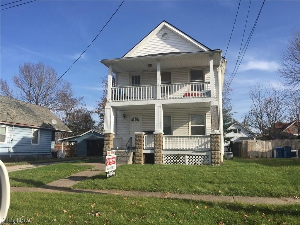 Updated 2 bedroom with a convenient central location.  Close to shopping and major highways. You will enjoy the extra large front porch on hot summer nights and cool spring and fall.  Big living room with double insulated windows and screens plus mini blinds on every window.  The carpet throughout is like-new and in great condition. Each bedroom has it's own closet. Nice updated bath with newer tub and shower over the tub, nice vanity too!  The kitchen has plenty of cupboard space, refrigerator and brand new self-cleaning range. There is a full basement with separate laundry hook ups.  Great storage space. The unit has gas heat and central air conditioning. There is plenty of parking and a nice yard to play and relax. Owner takes care of yard maintenance. You will be proud to call this place home.  Call and see today.