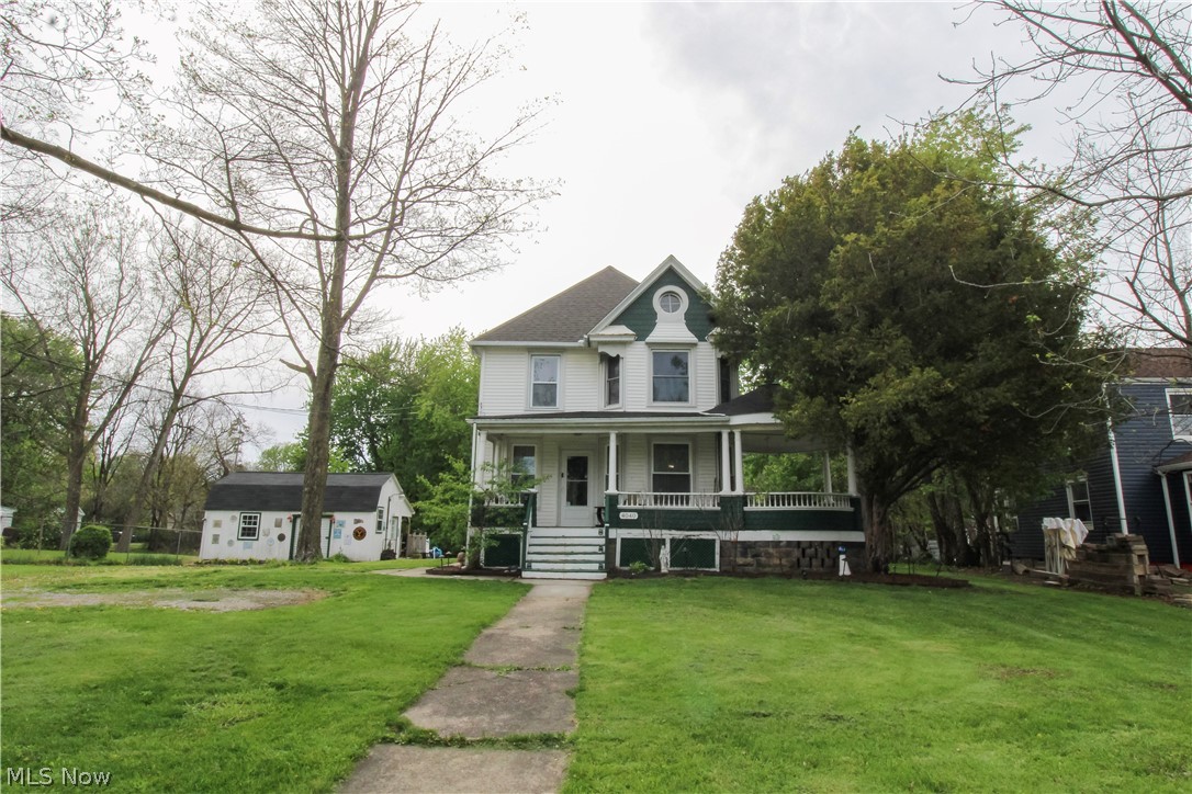 A Rare Opportunity to Continue the Story...Nestled on an oversized .66-acre lot, this beautiful Victorian style home is ready for its next chapter. This inviting home offers a unique blend of timeless appeal and modern-day convenience. Thoughtful updates have already been completed, providing peace of mind while still allowing room to make it your own.

Many of the big-ticket items have been addressed within approximately the last 10 years—including the roof, windows, wrapped exterior trim, plumbing, upstairs flooring, furnace, and updated electrical panel and wiring... including an external plug for an outdoor generator. A home warranty will be included for added piece of mind. Remodeled kitchen and bathrooms add to the home’s appeal, offering a more modern, functional space while complementing the character of the home.

Inside, you’ll find the craftsmanship that defines period homes, paired with an easy flowing layout that offers flexibility for today’s lifestyle. Each room invites you to imagine how it can reflect your personal style while maintaining timeless charm.

The expansive property is a true standout, offering space to relax, entertain, or create your own outdoor retreat; something rarely found at this price point. An above-ground pool with covered deck enhances the backyard setting, making it ideal for enjoying the warmer months.

Conveniently located with easy highway access, this home provides both charm and accessibility, perfect for those looking to enjoy space without sacrificing convenience.

A rare combination of character, updates, and land...ready to welcome its next owner. Reach out for your private showing!