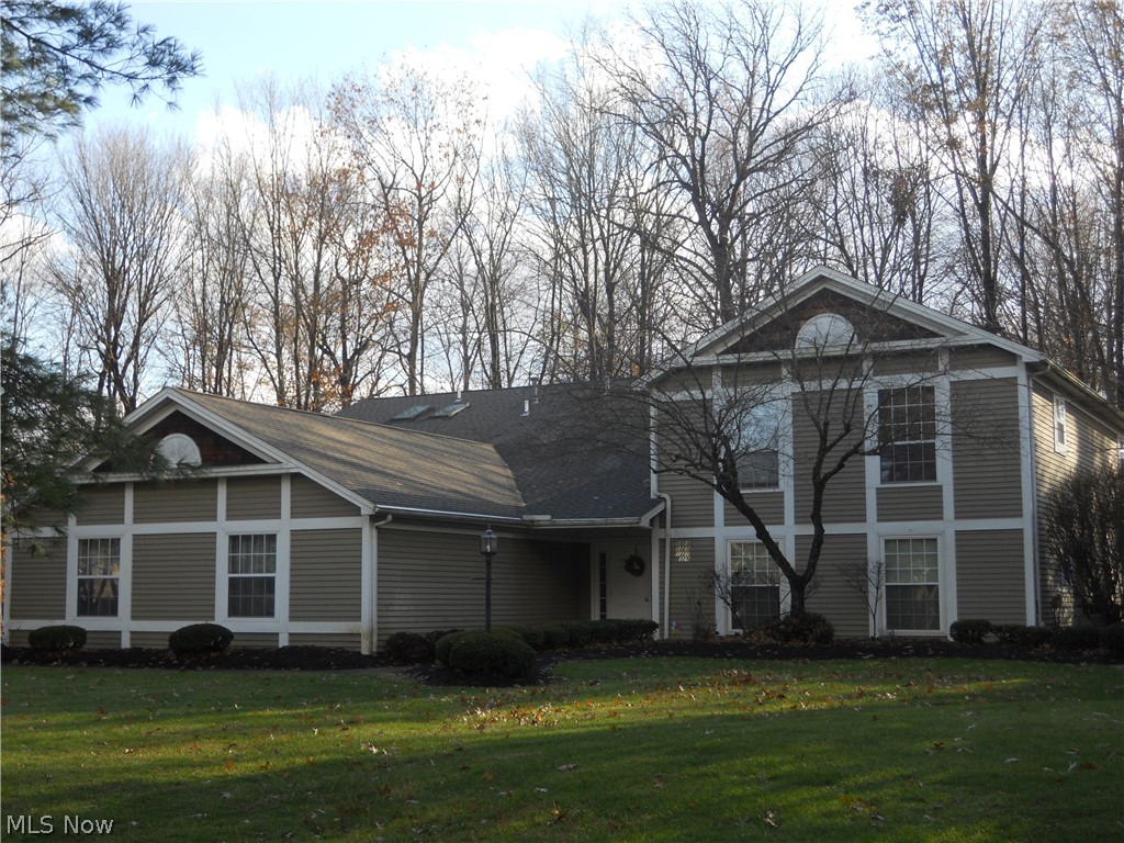 JUST PUT ON THE MARKET! Ideal 2 bedroom MAIN FLOOR UNIT with open concept between living room, dining room and foyer. Delightful kitchen with all appliances, ceramic floor and eating space. Enclosed rear porch looking into wooded setting. 2 full bathrooms that includes a walk in shower in master bedroom and laundry room with laundry tray sink and washer/dryer. Up dated roof shingles and driveway/parking area. Attached garage plus additional storage room on second floor! Don't wait call today! Immediate occupancy upon transfer.