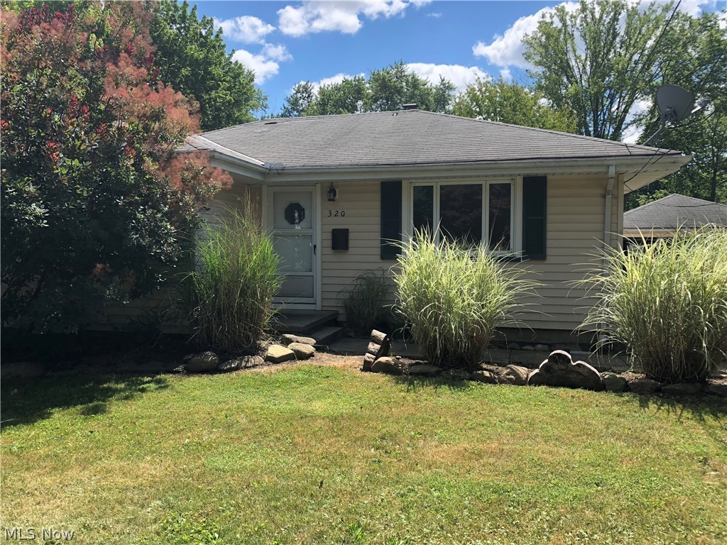 WELCOME HOME TO THIS COZY/CUTE BEDFORD RANCH. YOU WILL FALL IN LOVE WITH THE VIEW FROM THE FAMILY ROOM OF THE HUGE BACK YARD, WHICH IS ALMOST COMPLETELY FENCED. THE HOME HAS BEEN COMPLETELY REMODELED. THE LARGE LIVING  ROOM  AND HAS BEAUTIFUL GLEAMING HARDWOOD WITH ABSOLUTELY  NO STAINS AND  CARRIES THROUGH TO THE 2 SPACIOUS BEDROOMS AND DINING ROOM.  THE MAIN BATH IS DONE WITH WHITE BEAD BOARD WAINSCOTING, GORGEOUS NEUTRAL TILE, NEW VANITY AND TOILET. THE NICE SIZED DINING ROOM OFF THE KITCHEN WHICH ALSO LEADS TO THE AWESOME FAMILY ROOM. THIS ROOM IS FINISHED WITH SCULPTED TILE AND PLUSH CARPETING. THE TILE LEADS YOU THROUGH TO A HALF BATH AND SLIDER TO THE SPACIOUS CONCRETE PATIO. OUTDOORS IS A NICE 2 CAR DETACHED GARAGE AND A HUGE BACK YARD. THIS HOME COULD EASILY BE MADE A 3 BEDROOM BY ADDING A DOOR TO THE ENTRANCE OF THE FAMILY ROOM OR CONVERT THE LIVING ROOM. THE SELLER WOULD CONSIDER THE CONSTRUCTION OF ONE OF THESE OPTIONS AT NO COST.