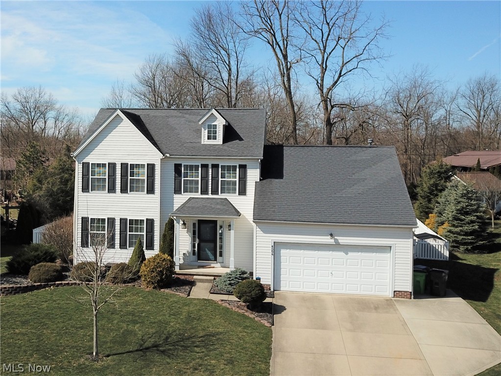 Welcome to 4394 Ridge View Drive in Uniontown! You will be amazed at this beautiful 3-bedroom, 2.5-bathroom home as soon as you pull up; it has bright white siding complimented by black shutters. The spacious backyard is fully fenced in and has a large porch, perfect for relaxing or entertaining outside. Step into the spacious foyer to see entrances into the formal living room and kitchen. The eat-in kitchen has lovely luxury vinyl plank flooring, a breakfast bar, and access to the backyard through the sliding glass doors. A cozy den with a fireplace and slanted ceiling  is located right off the kitchen. Half bath and laundry room both located on main floor. Upstairs you will find the master suite (complete with a walk-in closet and bathroom), along with two more bedrooms and another full bath. The stunning finished basement offers so many possibilities! Brand new furnace, new furnace and roof. This home is located in a quiet neighborhood, yet is still conveniently located a few minute