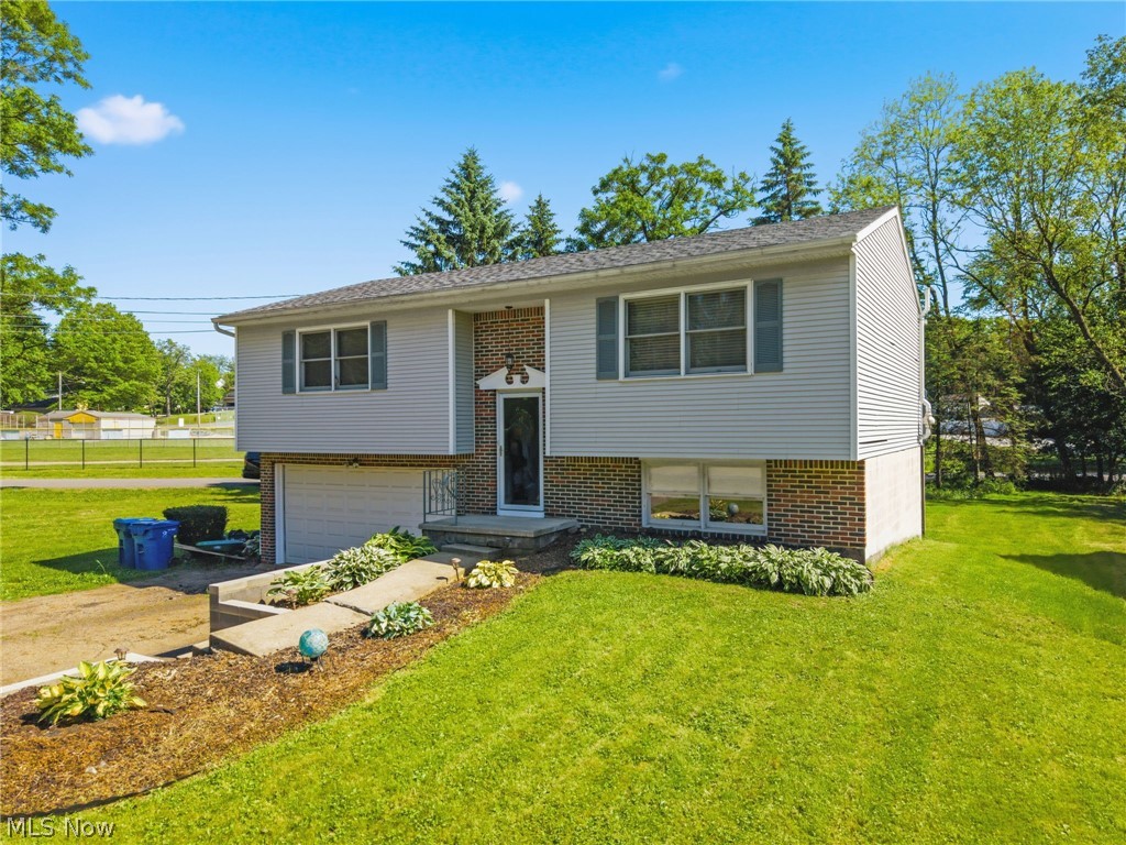 Welcome to Akron, located in the highly desirable Coventry Local School District and just minutes from the beautiful Portage Lakes area. This well-maintained home offers a combination of modern updates, everyday convenience, and access to one of Summit County's most sought-after communities.

Inside, you'll find new luxury vinyl tile (LVT) flooring in the kitchen, a beautifully renovated primary bathroom, and fresh paint throughout much of the home, creating a bright and updated feel. The kitchen comes equipped with newer appliances, including the refrigerator, stove, and microwave, all included in the sale. A reverse osmosis drinking water system and water softener provide added comfort and convenience. The washer and dryer will also remain with the home, making moving in even easier.

In the lower level there is a nice size finished area that could be used as an additional bedroom or additional living space.

Beyond the home, you'll enjoy being part of the Coventry School District and the scenic Portage Lakes community. The area is known for its outstanding recreational opportunities, including boating, fishing, kayaking, waterfront dining, and outdoor activities. Nearby Portage Lakes State Park offers public lake access, a beach, hiking trails, and year-round recreation. Residents appreciate the area's unique blend of lakeside living while remaining conveniently close to shopping, dining, entertainment, downtown Akron, and major highways.

Whether you're looking for a move-in-ready home, access to excellent local amenities, or the charm of the Portage Lakes lifestyle, this property offers an exceptional opportunity to enjoy the best of Coventry living. Schedule your private showing today!
