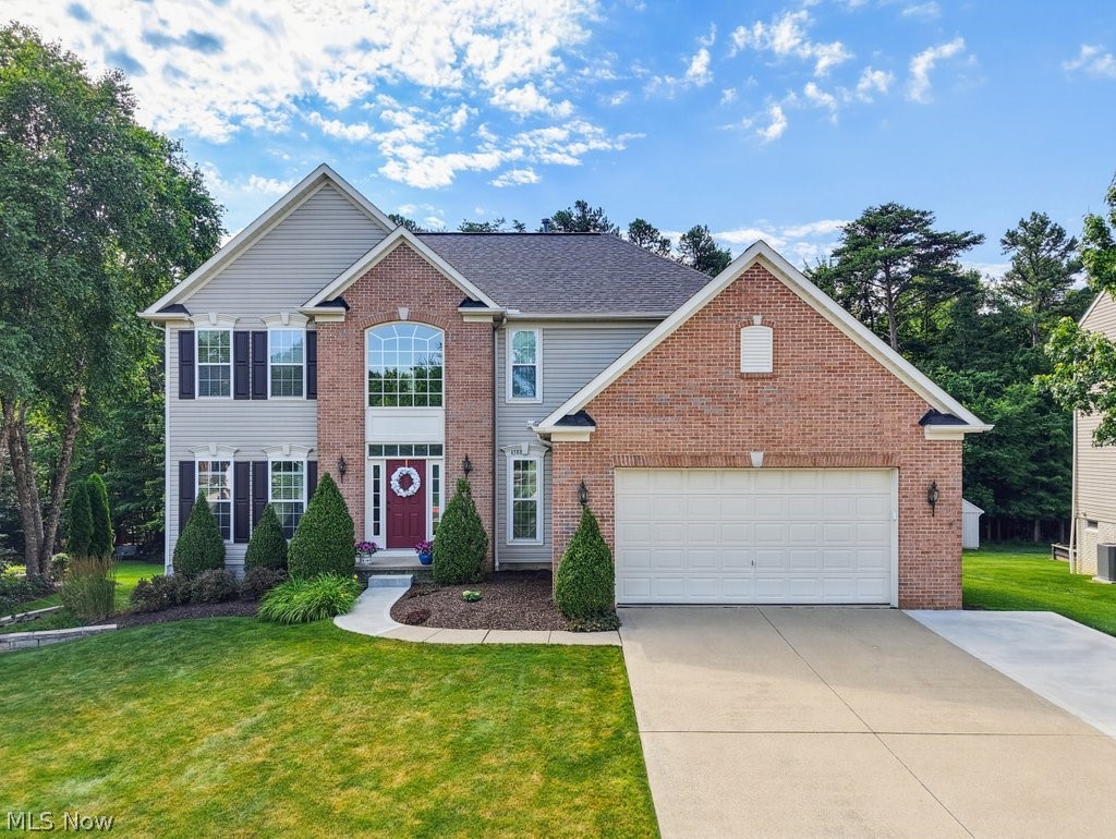 Located in the highly desirable Lexington Ridge community, this thoughtfully updated colonial is loaded with upgrades and offers exceptional living space throughout. With 4 bedrooms, 2.5 bathrooms, over 2,800 square feet above grade, and a finished walkout basement, there's room for everyone to spread out and enjoy.  The main level features a private office, formal dining room, den, sunroom, half bath, and an expansive kitchen with abundant cabinetry and storage. Step outside onto the brand-new deck (2025), where you'll enjoy peaceful views of more than 17 acres of wooded green space, creating a private and picturesque backdrop.  Upstairs, the spacious owner's suite boasts a tray ceiling, large walk-in closet, dual vanities, a walk-in shower, and a relaxing soaking tub. Three additional generously sized bedrooms, each with ample closet space, and a full bathroom complete the second floor.  The finished walkout basement provides even more versatile living space and includes a dedicated workshop, making it ideal for hobbies, projects, or extra storage.  Recent updates include a new roof (2024), carpet (2024), driveway pad extension (2024), hot water tank (2023), and air conditioning (2020), with many additional improvements throughout.  Conveniently located just a short walk from H.G. Blake Elementary School, the community clubhouse, pool, and playground, this home combines space, updates, and an unbeatable location. Don't miss your opportunity to make this exceptional home yours!