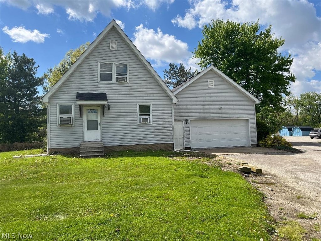 A 5-Acre Residential Agriculture Family Home with a business location in New Russia Township and Oberlin Schools. Great location off of Route 511 which is nestled close to Baumhart Road and the Ohio Turnpike to the West, and 1 mile to the City of Oberlin to the East. The agriculture residential 3-bedroom 2 bath family home consists of 1924 Sq Ft of living space, an additional 962 sq ft in the open basement and a storage attic upstairs. Monstrous 2 car garage with opener. Yes, the family home requires updating but let's talk about the additional offices, pole barns and storage sheds belonging to this sale. Several large pole barns with doors for storage of vehicles and equipment, numerous storage sheds, a comfortable business office and additional grounds make up the 5 acres to this property. Currently being rented out to a Lawn Business with a 7-years lease still in effect, However, tenant and seller will cancel the lease if buyer wants use of the grounds and the buildings. Electric heat. Septic system. Lorain County rural water. Start bringing your local business to New Russia Township and check out the 3 Bedroom 2 Bath 2 Car family home or use it as a rental income. Check out the 80 by 50 pole barn.  Check out the 32 by 54 business office. Check out the Canvas Storage unit 24 by 24. Check out the 2 hoop houses 24 by 28 and 24 by 32. Snooze on this property and you could lose out on a very good investment. Yes, the Seller agrees to review carefully all written offers. Contact Listing Agent for additional information on this 5 acre site.