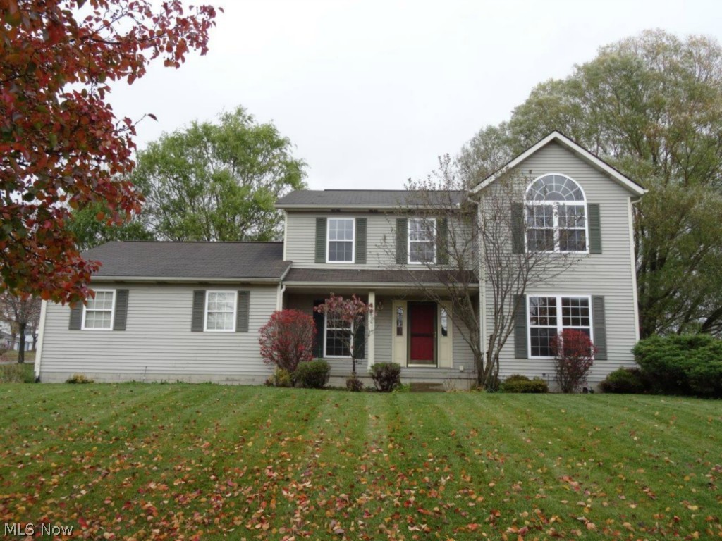 Stop your search, this may be the nicest home you will find in this price range! Super clean Stow colonial sits on a large lot with private back yard, professional landscaping, and a huge three-level deck for entertaining.  The interior has been completely redone, every room has brand new carpet and paint in tasteful modern décor.  The main living area features formal living and dining rooms, as well as a cozy family room complete with fireplace.  Open eat-in kitchen w/oak cabinetry.  These is even a dedicated first floor office, half bath, and laundry.  Upstairs you will find a huge master suite w/vaulted ceiling and ample sized bedrooms.  The modern bathrooms also have brand new flooring. Finally there is an oversized 2-car garage and 12-course basement that is neat as a pin! Hot water tank 2014. Don't miss out on this one!