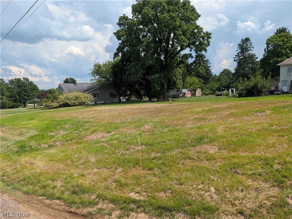 Build-ready opportunity in the desirable Tuslaw Local School District! This 0.37-acre residential lot has already undergone major site preparation, including demolition of the previous structure, full clean out and removal of foundation, professional backfilling, grading, seeding, and straw coverage. A 155-foot well remains on the property and has been brought up to code, offering significant value and savings for future construction. This corner lot provides a clean, open homesite with established utility history and excellent potential for a custom home. Conveniently located with a rural feel while still offering easy access to Massillon, Canton, and surrounding areas. Rare chance to purchase a lot outside of a busy neighborhood, less than a mile from Tuslaw Schools with no zoning and no city taxes!